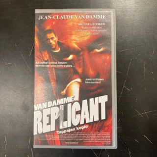 Replicant - tappajan kopio VHS (VG+/M-) -toiminta/sci-fi-